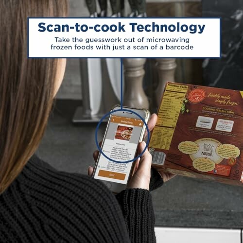 Person scanning a frozen food package with a smartphone using scan-to-cook technology.