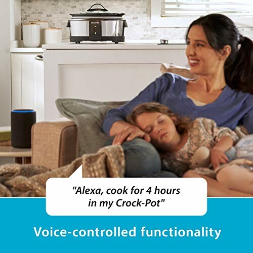 Woman relaxing with children, using voice-controlled Crock-Pot.